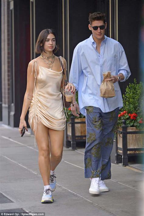 dua lipa nip slip|Dua Lipas Naked Dress Was, Fittingly, Covered In。